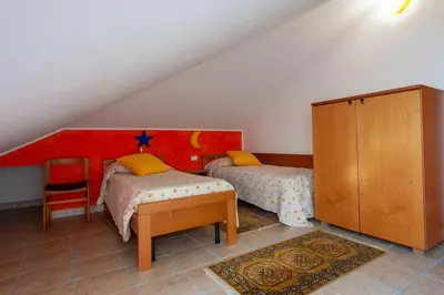 Letto o letti in una camera di Villa Chloe