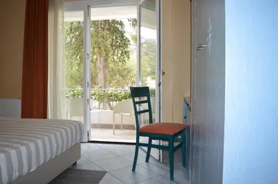 Letto o letti in una camera di Hotel Chentu Lunas