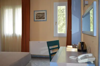 Letto o letti in una camera di Hotel Chentu Lunas