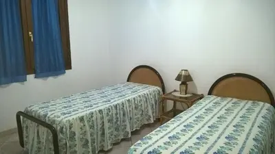 Letto o letti in una camera di Casa Monika