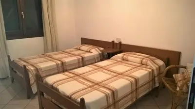 Letto o letti in una camera di Casa Monika