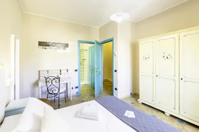Letto o letti in una camera di Giaco's Rooms