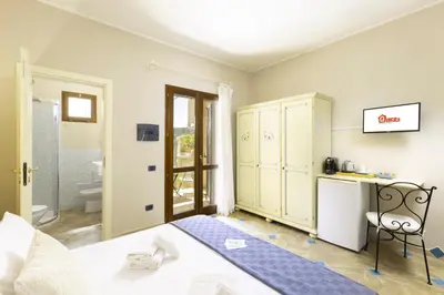 Letto o letti in una camera di Giaco's Rooms