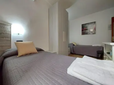 Letto o letti in una camera di B&B Villa Martina