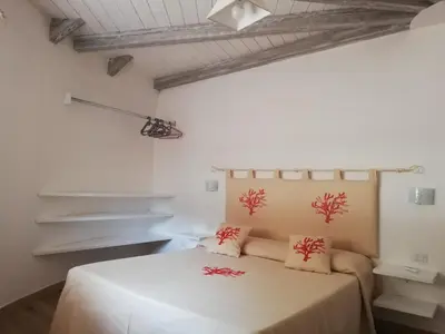 Letto o letti in una camera di Agriturismo Dolceluna Le Capanne