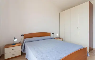 Letto o letti in una camera di Villa 6