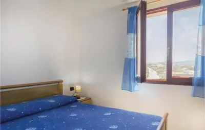 Letto o letti in una camera di Casa Stella Maris