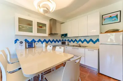 Cucina o angolo cottura di Villa Perdalonga, Vista Mare Sea View Tuerredda SouthSardiniaHolidays