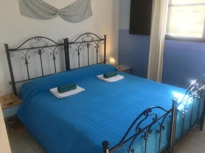 Letto o letti in una camera di Garden Rooms