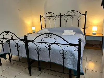 Letto o letti in una camera di Garden Rooms