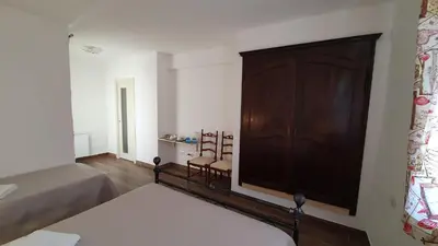 Letto o letti in una camera di DOMU NOSTA di Giulio & Ignazia Room2