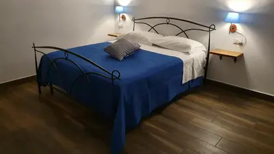 Letto o letti in una camera di DOMU NOSTA di Giulio & Ignazia Room1