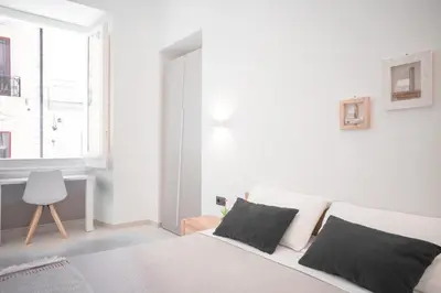 Letto o letti in una camera di Linee Moderne Apt - Wifi - AC