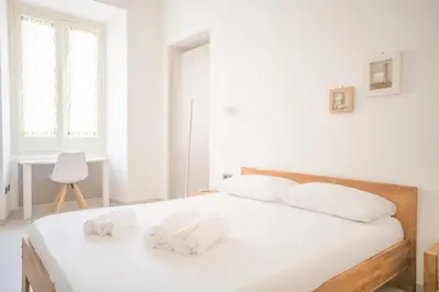 Letto o letti in una camera di Linee Moderne Apt - Wifi - AC