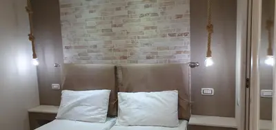 Letto o letti in una camera di Guesthouse Luisella