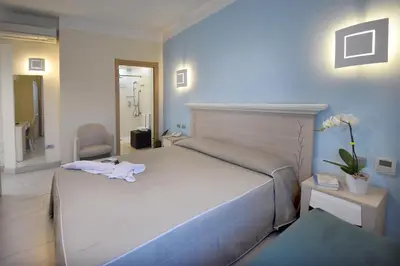 Letto o letti in una camera di Hotel Belvir