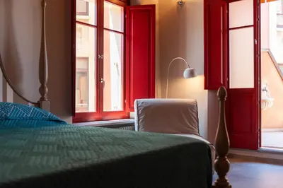 Letto o letti in una camera di DOMO SOFIA