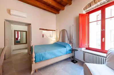 Letto o letti in una camera di DOMO SOFIA