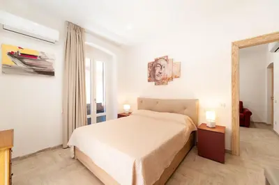 Letto o letti in una camera di DOMO ALLE