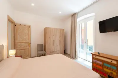 Letto o letti in una camera di DOMO ALLE