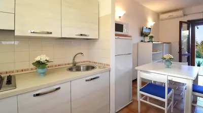 Cucina o angolo cottura di Residence Il Vascello