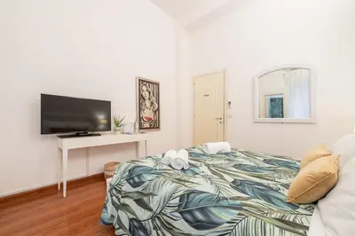 Letto o letti in una camera di Blanco Rooms