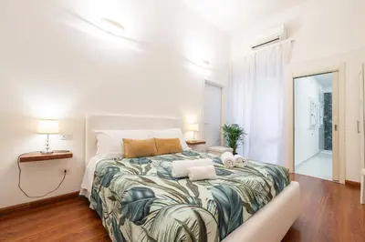 Letto o letti in una camera di Blanco Rooms