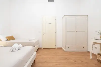 Letto o letti in una camera di Blanco Rooms