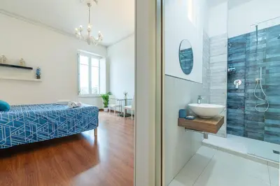 Letto o letti in una camera di Blanco Rooms