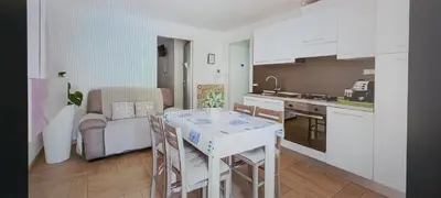 Cucina o angolo cottura di APPARTAMENTO 5 pers PARCHEGGIO