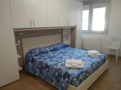 Letto o letti in una camera di CAMERA con BAGNO 2 pers PARCHEGGIO