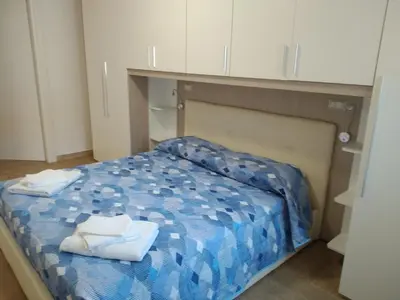 Letto o letti in una camera di CAMERA con BAGNO 2 pers PARCHEGGIO