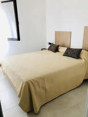 Letto o letti in una camera di Villa Matu’