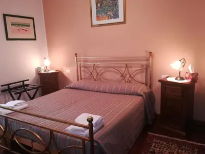 Letto o letti in una camera di Domomea