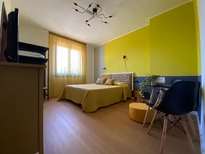 Letto o letti in una camera di La Tortorella Room & Apartment