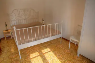 Letto o letti in una camera di Casa dei pescatori