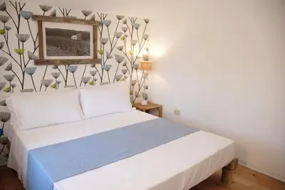 Letto o letti in una camera di Hotel Galman