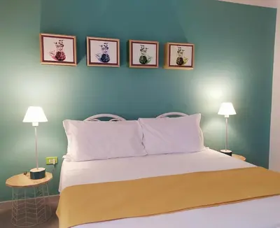 Letto o letti in una camera di Hotel Galman