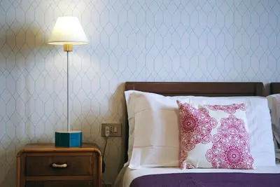 Letto o letti in una camera di Hotel Galman
