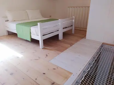 Letto o letti in una camera di Hotel Galman
