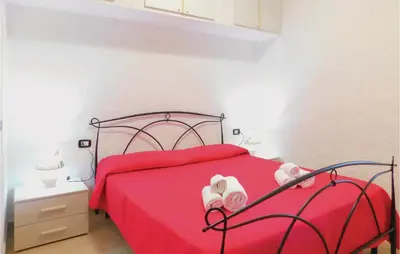 Letto o letti in una camera di Nice Apartment In Gonnesa With Wifi