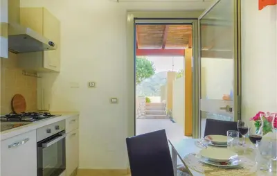 Cucina o angolo cottura di Nice Apartment In Gonnesa With Wifi