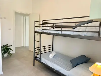 Letto o letti in una camera di Poetto Beach House-Ausonia