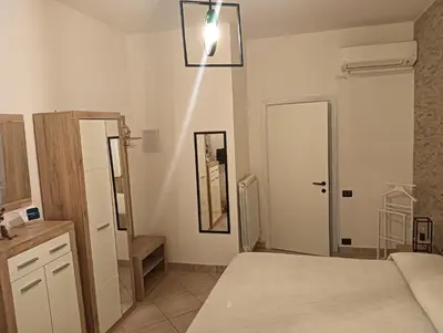 Letto o letti in una camera di Domos Le Due Tuie