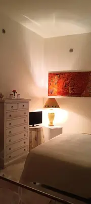 Letto o letti in una camera di Domos Le Due Tuie