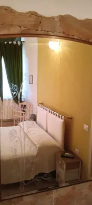 Letto o letti in una camera di Domos Le Due Tuie