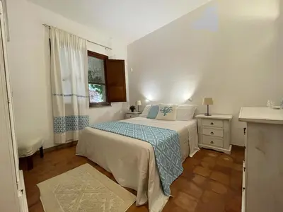 Letto o letti in una camera di Rokkaria Holidays Apartments