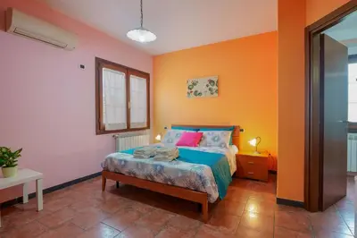 Letto o letti in una camera di B&B Gassa d'Amante