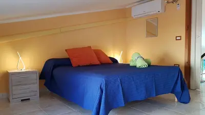 Letto o letti in una camera di The Yellow House IUN P3446