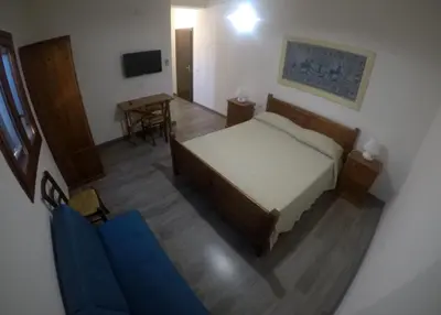 Letto o letti in una camera di Agriturismo Su Meurreddu